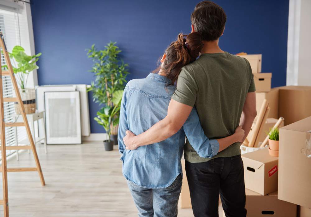 Couple looking at their new home